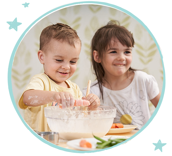 Children exploring food experiences with Green Leaves daycare