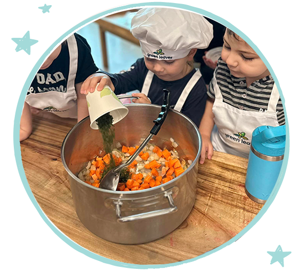 Children Preparing a meal with Green Leaves chef