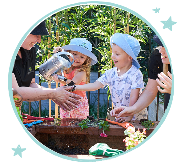 green leaves educator playing in outdoor play space with happy children enjoying nature